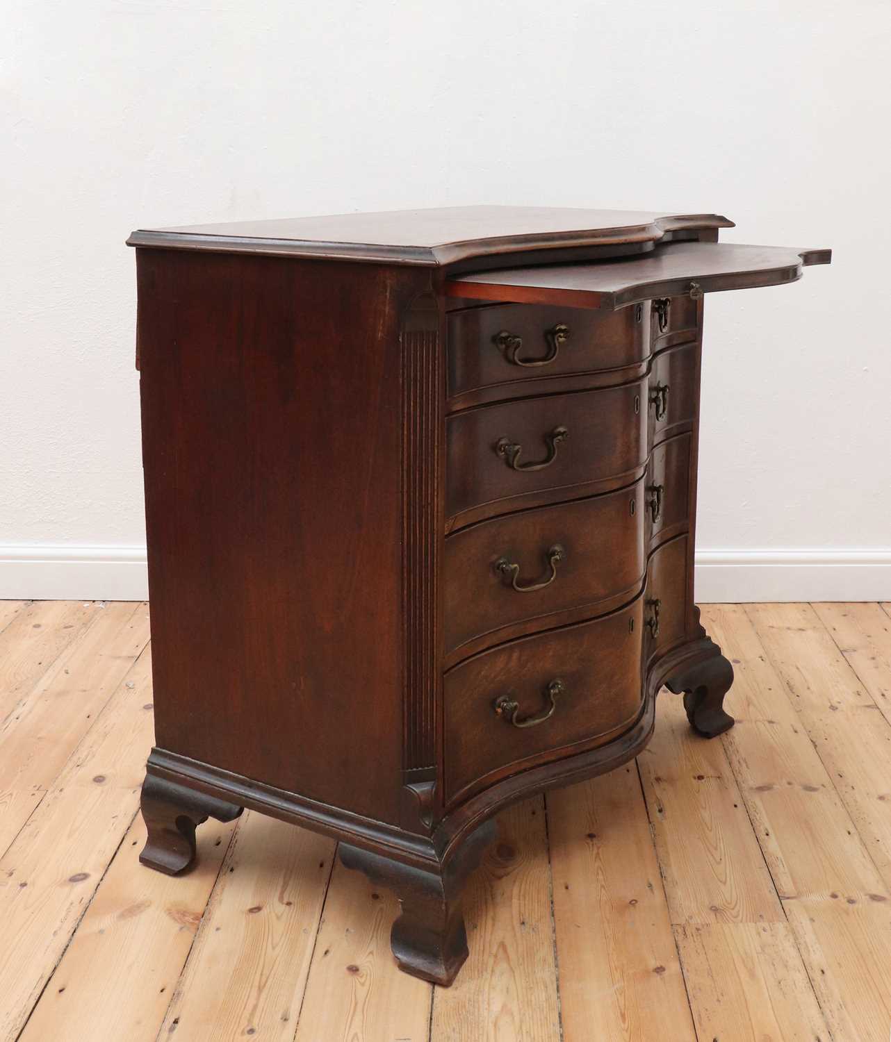 A George III serpentine mahogany chest of drawers, - Image 3 of 11