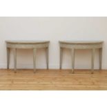 A pair of Swedish Gustavian-style painted demilune side tables,