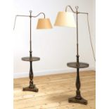 A pair of black-lacquered reading lamp standards