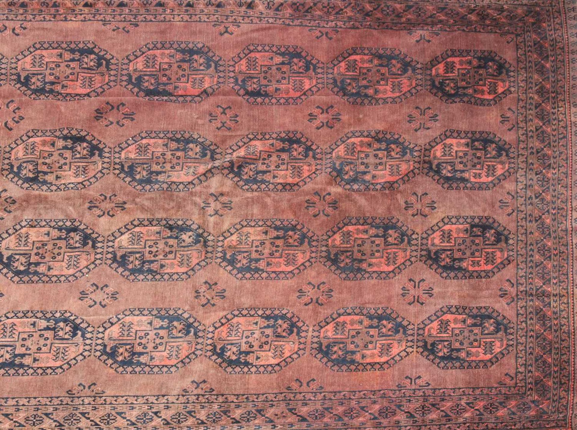A Tekke Bokhara carpet, - Image 3 of 12