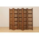 A Spanish fruitwood folding screen,