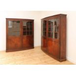 A pair of mahogany bow front bookcases,