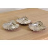 A set of three George III silver butter dishes,