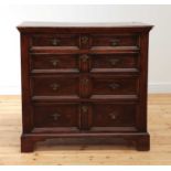 An oak chest of drawers,