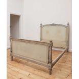 A French Louis XVI-style painted double bed,