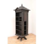 An American 'Tabard Inn Library' ebonised oak revolving bookcase,