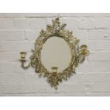 A gilt brass girandole wall mirror,