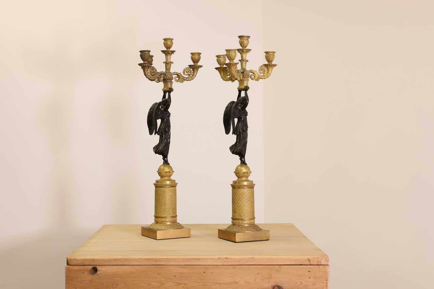 A pair of French Empire ormolu and bronze candelabra, - Image 3 of 30