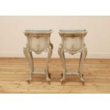 A pair of French Louis XV-style painted bedside tables,