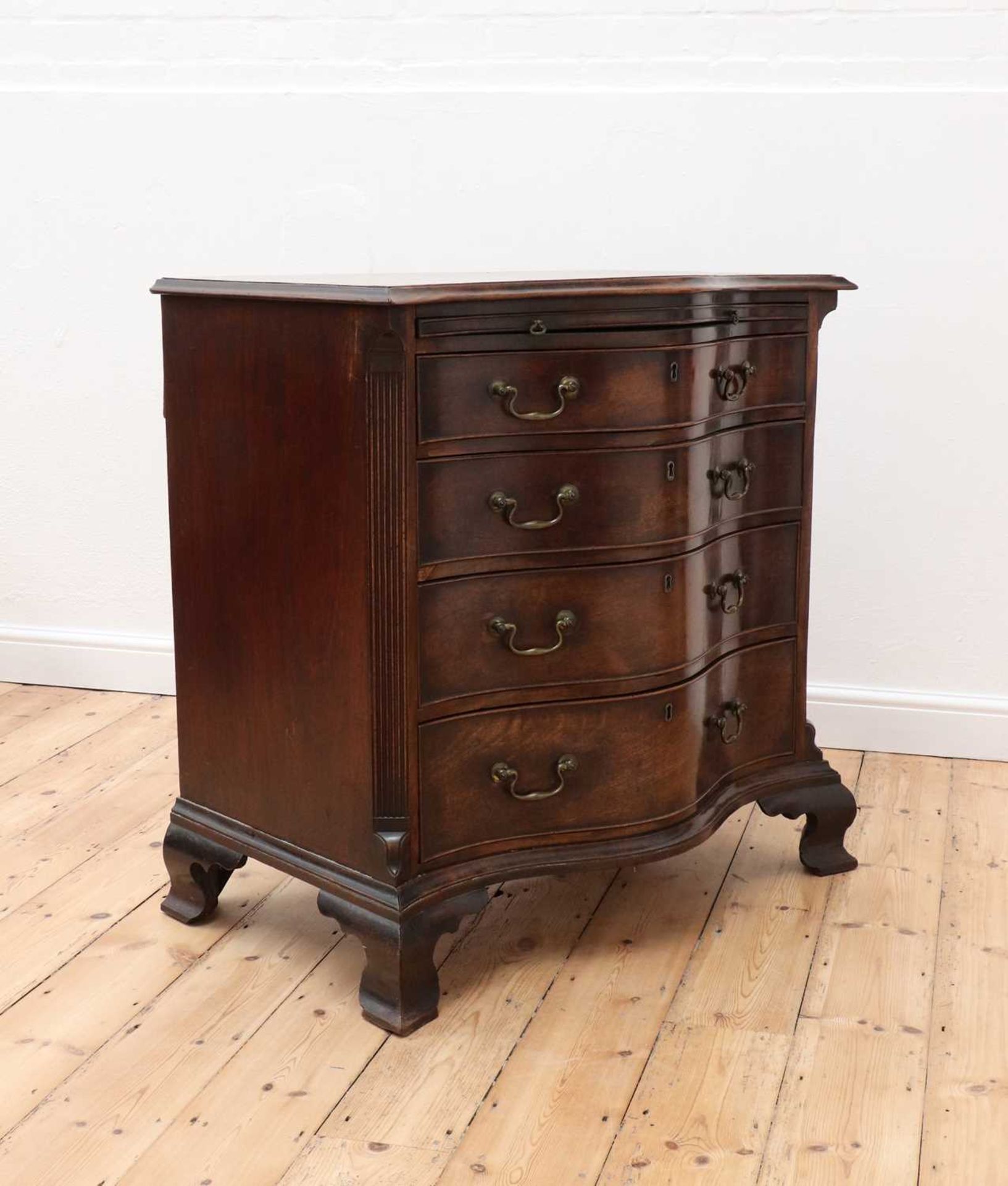 A George III serpentine mahogany chest of drawers, - Image 2 of 11