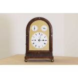 A Regency brass inlaid rosewood mantel clock,