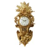 A large Louis XVI-style gilt-bronze cartel clock,