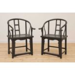 A pair of Chinese-style ebonised softwood armchairs,