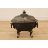 An ebonised and parcel-gilt toleware wine cooler,