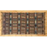 A Persian kilim flatweave rug,