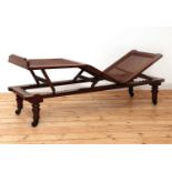 A Victorian caned campaign daybed,