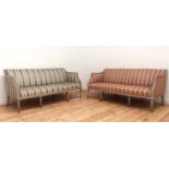 A pair of George III settees