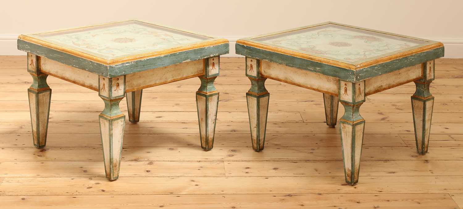 A pair of Continental painted wood low tables,