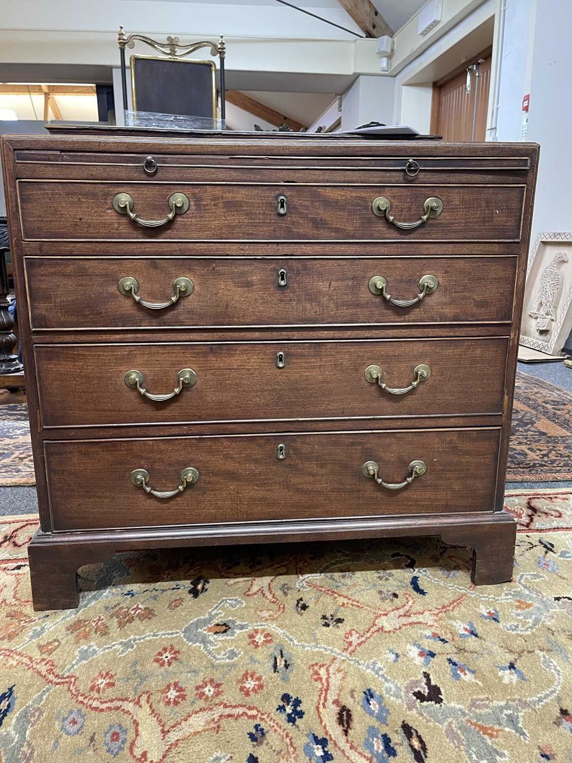 A George III mahogany caddy-top chest of drawers, - Image 10 of 48