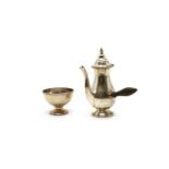 A silver side-handle coffee pot and sugar bowl