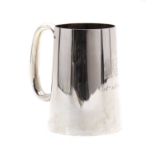 A large silver christening mug