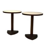 A pair of bistro tables,