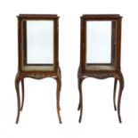 A pair of late Victorian mahogany bijouterie cabinets,