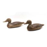 Two carved wood and painted duck decoys,