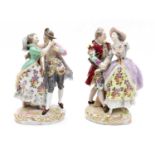 A pair of Meissen style figures,
