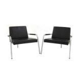 A pair of contemporary armchairs,