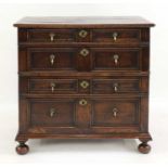 An oak geometric fronted chest,