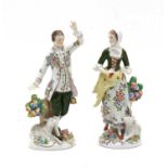 A pair of Sitzendorf porcelain figures of a shepherd and shepherdess,