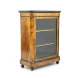 A Victorian figured walnut and ebonised pier cabinet