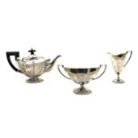 An Edwardian three piece silver tea service,