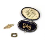 Three gold brooches,