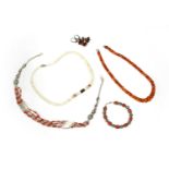 A single row graduated faceted cognac coloured amber bead necklace,