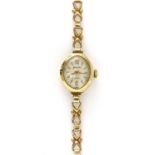 A ladies' 9ct gold Accurist mechanical bracelet watch,