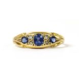 A gold sapphire and diamond ring,