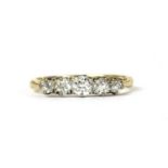 A gold five stone diamond ring,