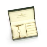 A ladies' 9ct gold Sovereign quartz bracelet watch,