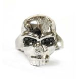 A 9ct white gold diamond set skull ring,