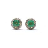 A pair of gold emerald and diamond cluster stud earrings,