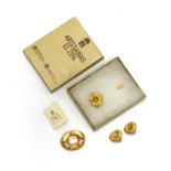 A gold plated stick pin, brooch and earrings suite,