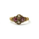 A Victorian 15ct gold garnet and split pearl ring,