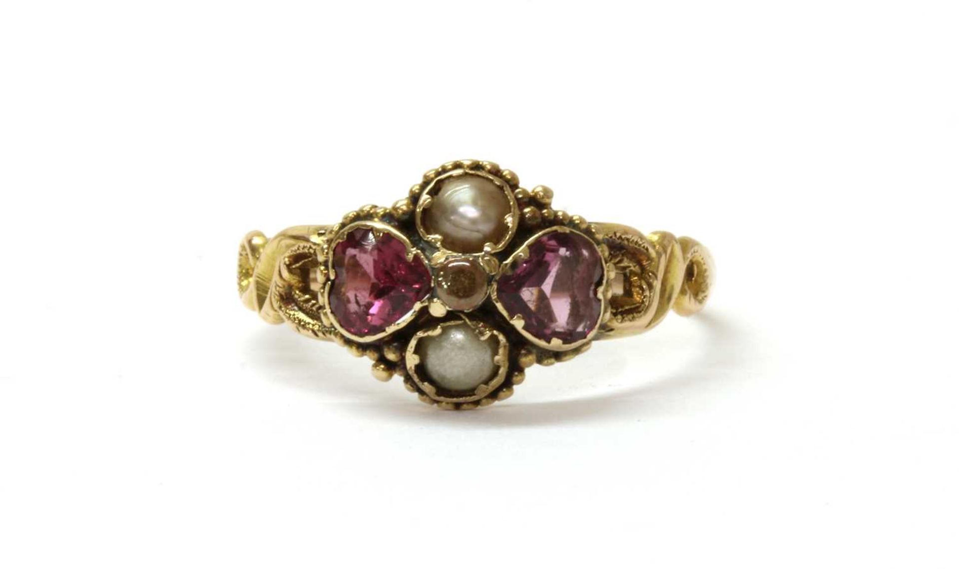 A Victorian 15ct gold garnet and split pearl ring,