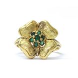 A gold emerald cluster ring,