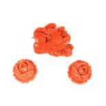 An Asian carved coral plaque brooch,