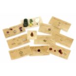 A quantity of unmounted gemstones,