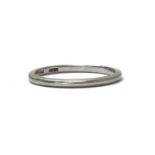 A platinum 'D' section wedding ring,