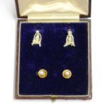 Two gold pearl set dress studs,